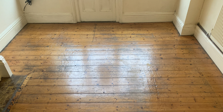 Old parquet floor with orange tones